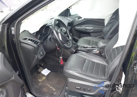 2016 Ford Escape Titanium z USA, uszkodzony, nr VIN 1FMCU9J95GUB27571